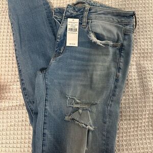 Distressed Blue Jeans